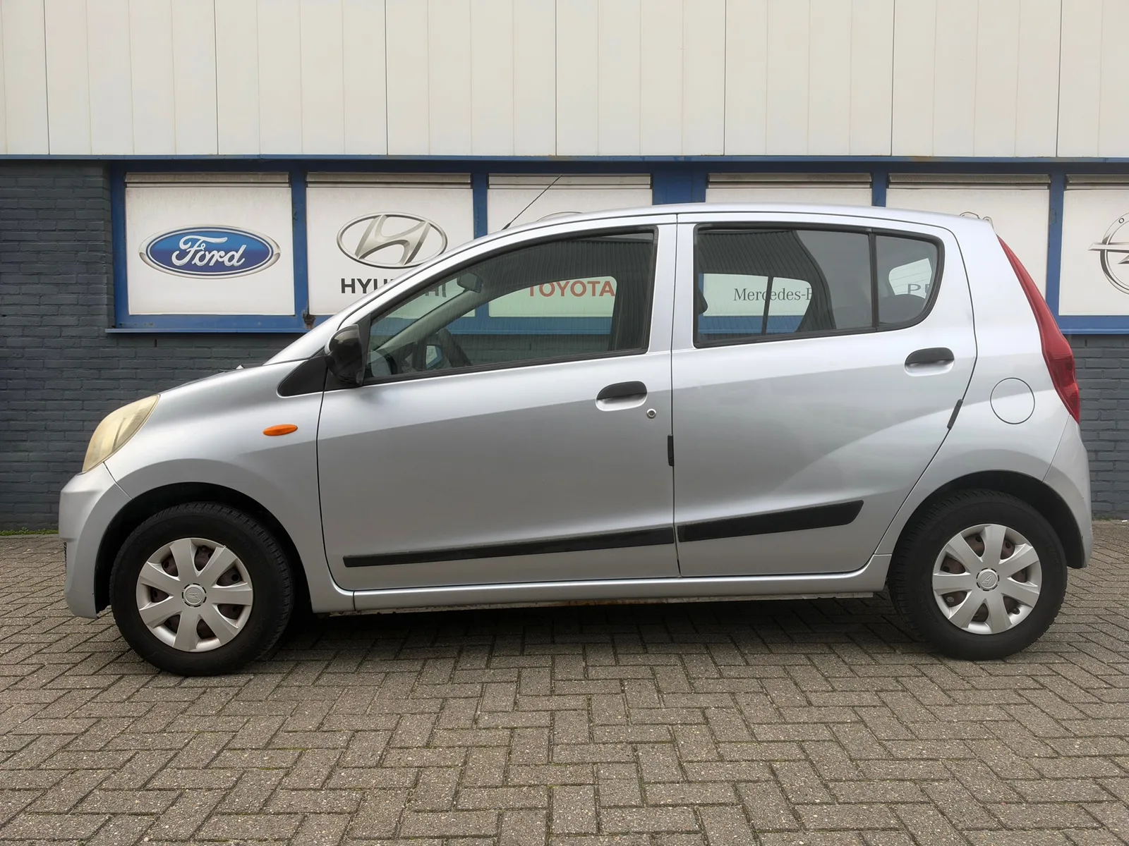 Daihatsu Cuore (2008) — foto 1