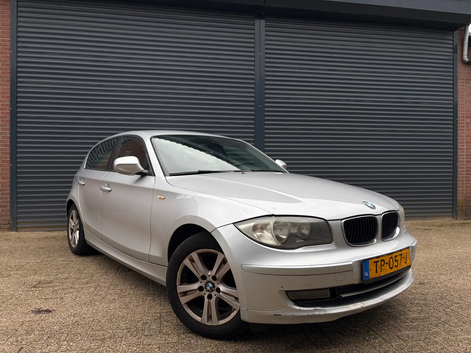 BMW 1-Serie (2011) — foto 1