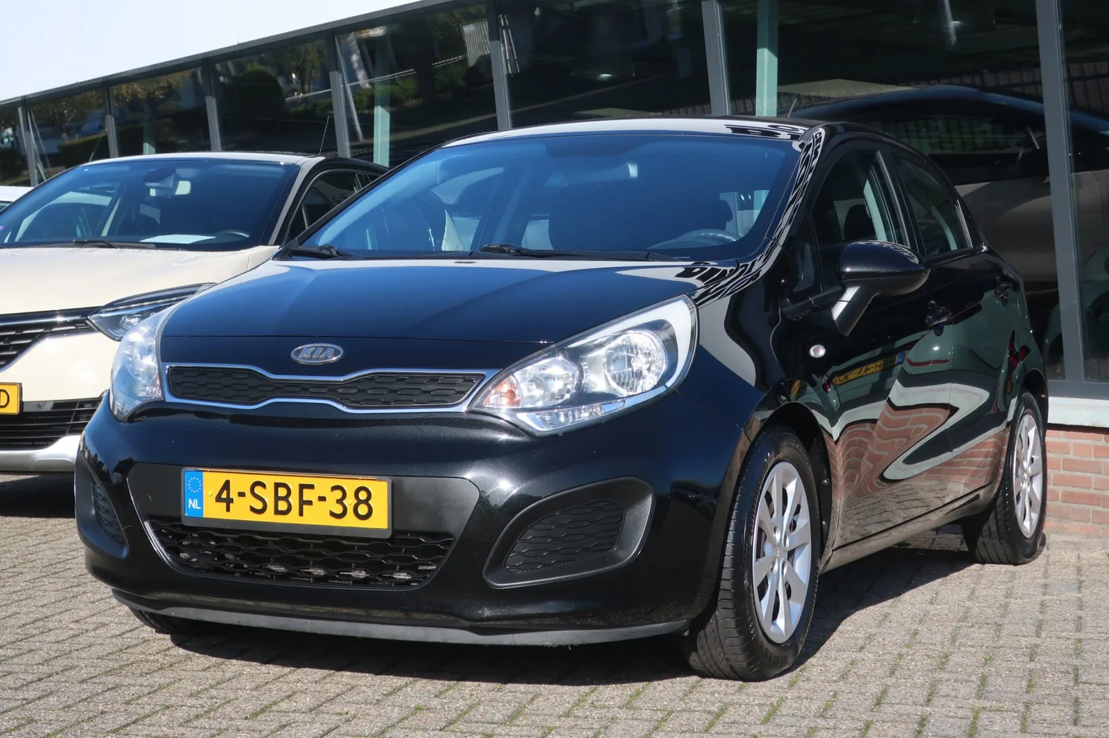 Kia Rio (2013) — foto 1