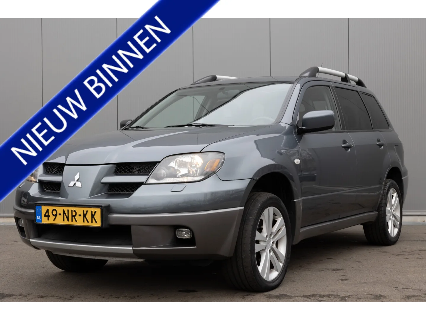 Mitsubishi Outlander (2004) — foto 1