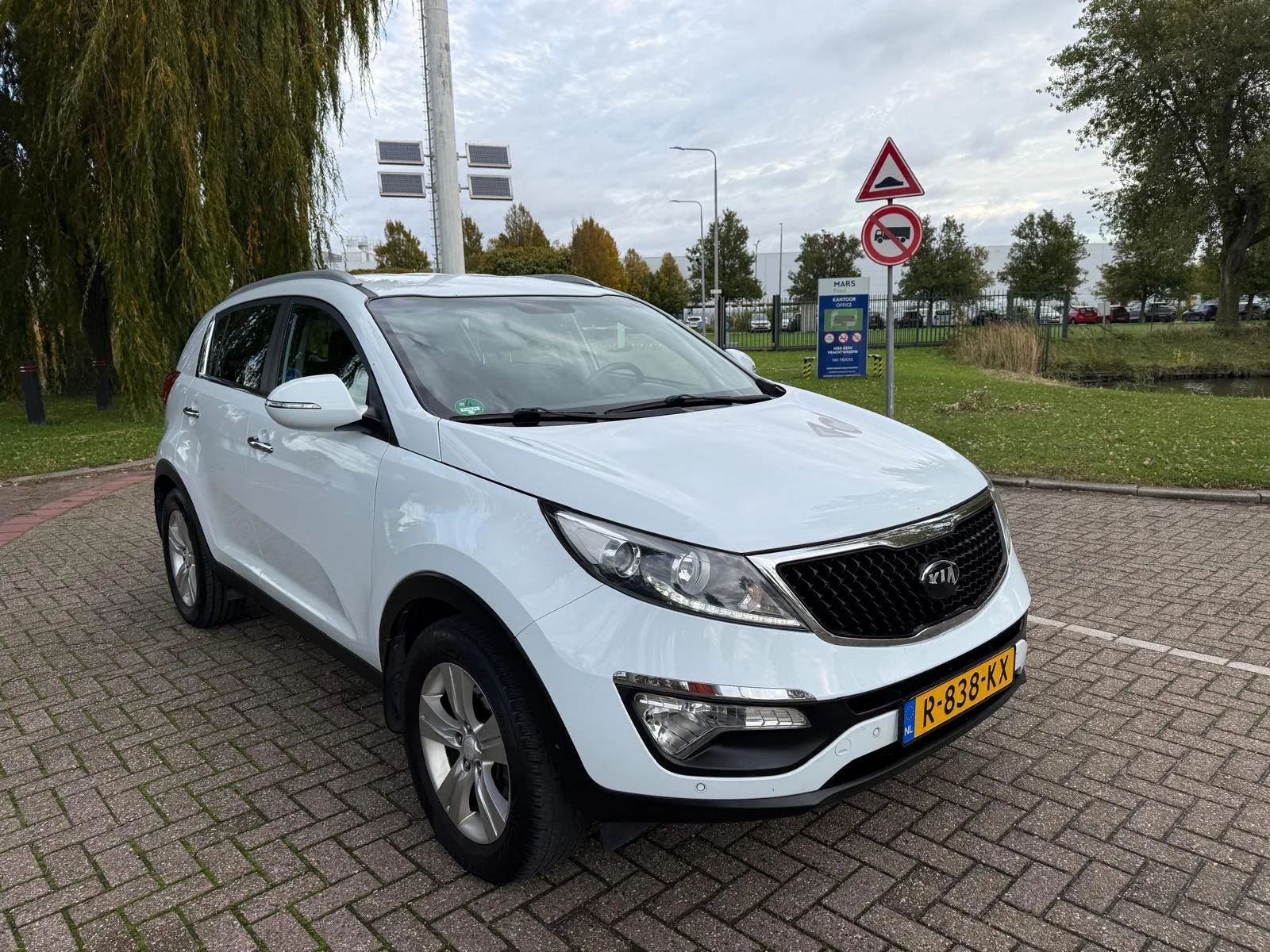 Kia Sportage (2013) — foto 1