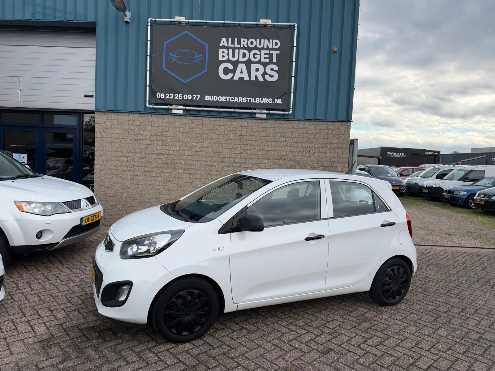 Kia Picanto (2011) — foto 1
