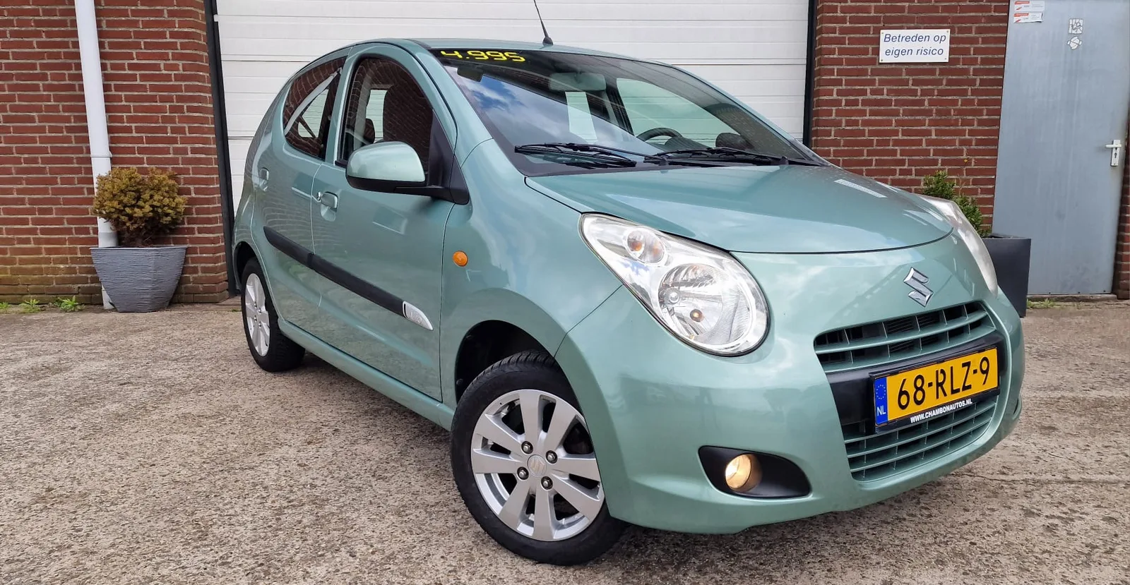 Suzuki Alto (2011) — foto 1