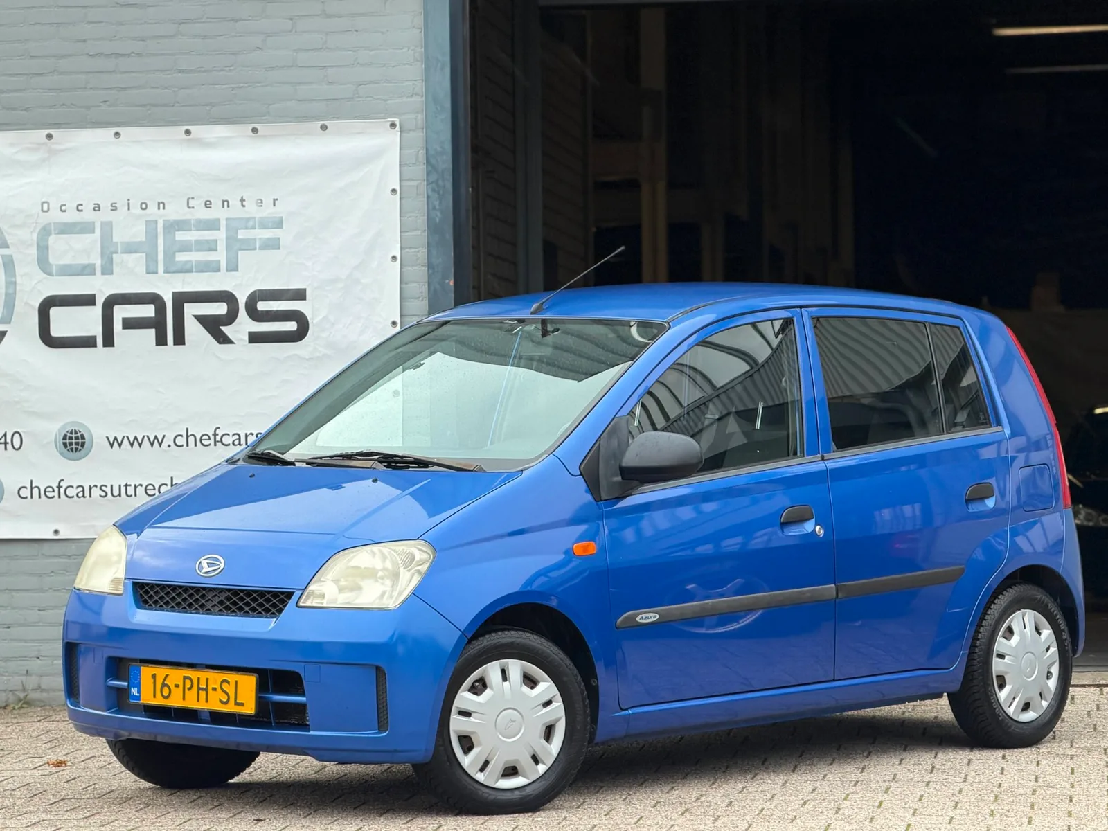 Daihatsu Cuore (2004) — foto 1