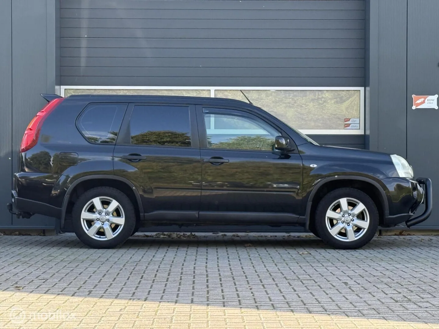 Nissan X-Trail (2009) — foto 1