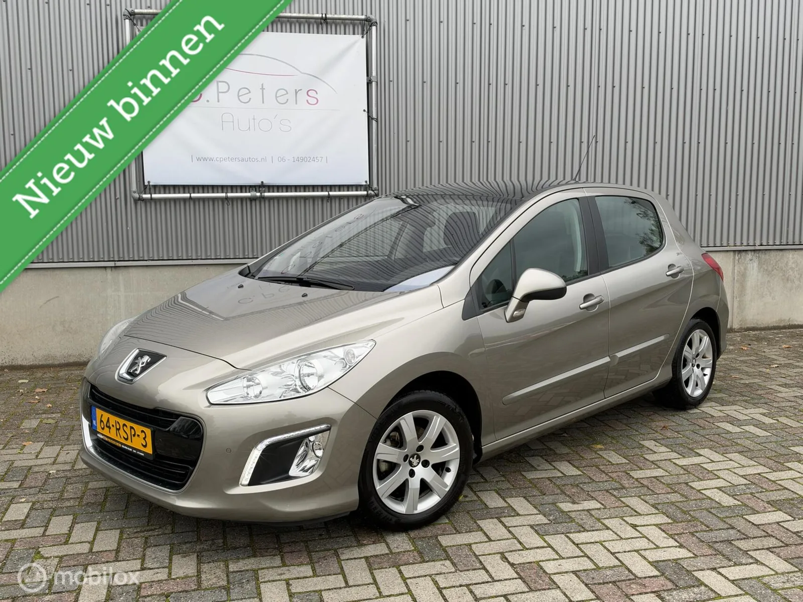 Peugeot 308 (2011) — foto 1