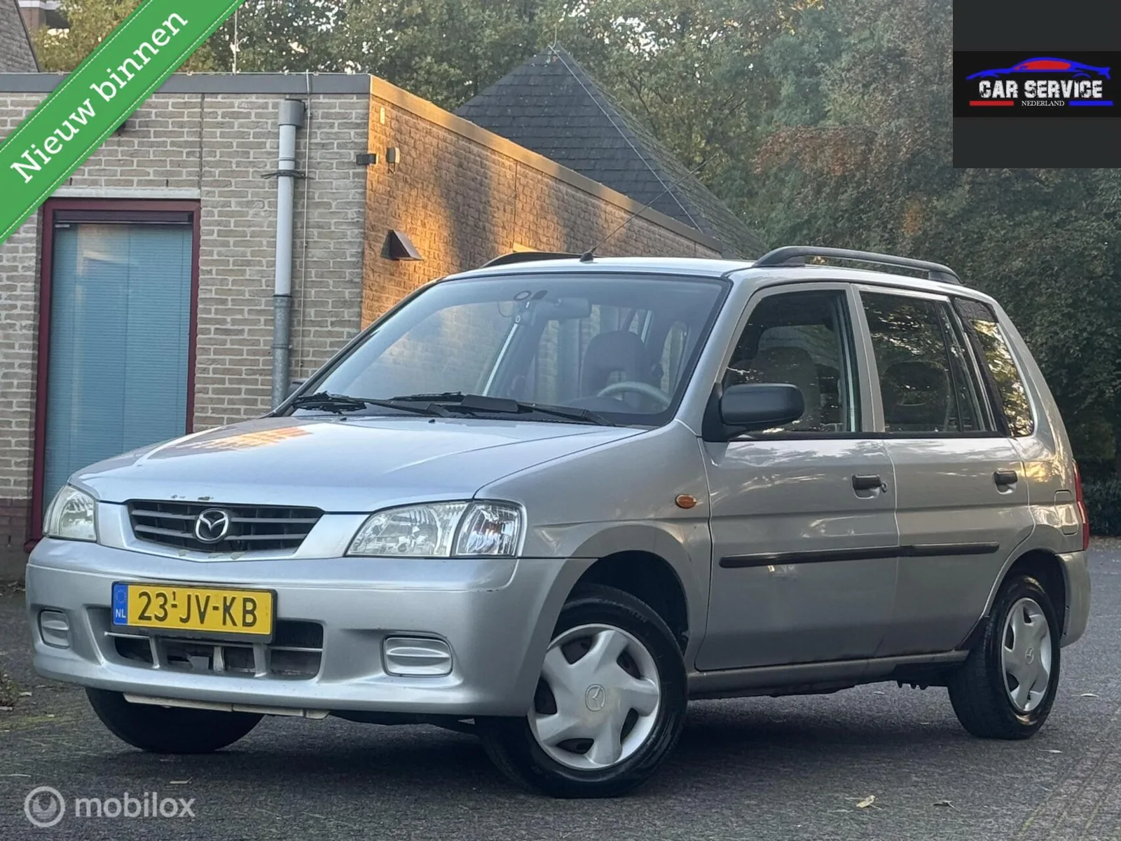 Mazda Demio (2002) — foto 1