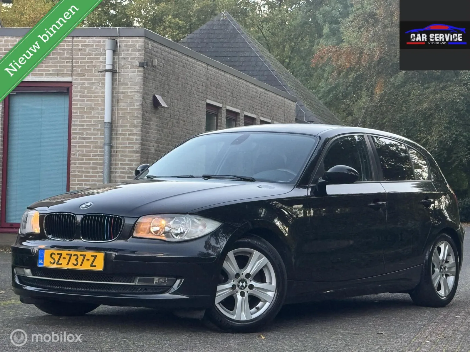 BMW 1-Serie (2009) — foto 1