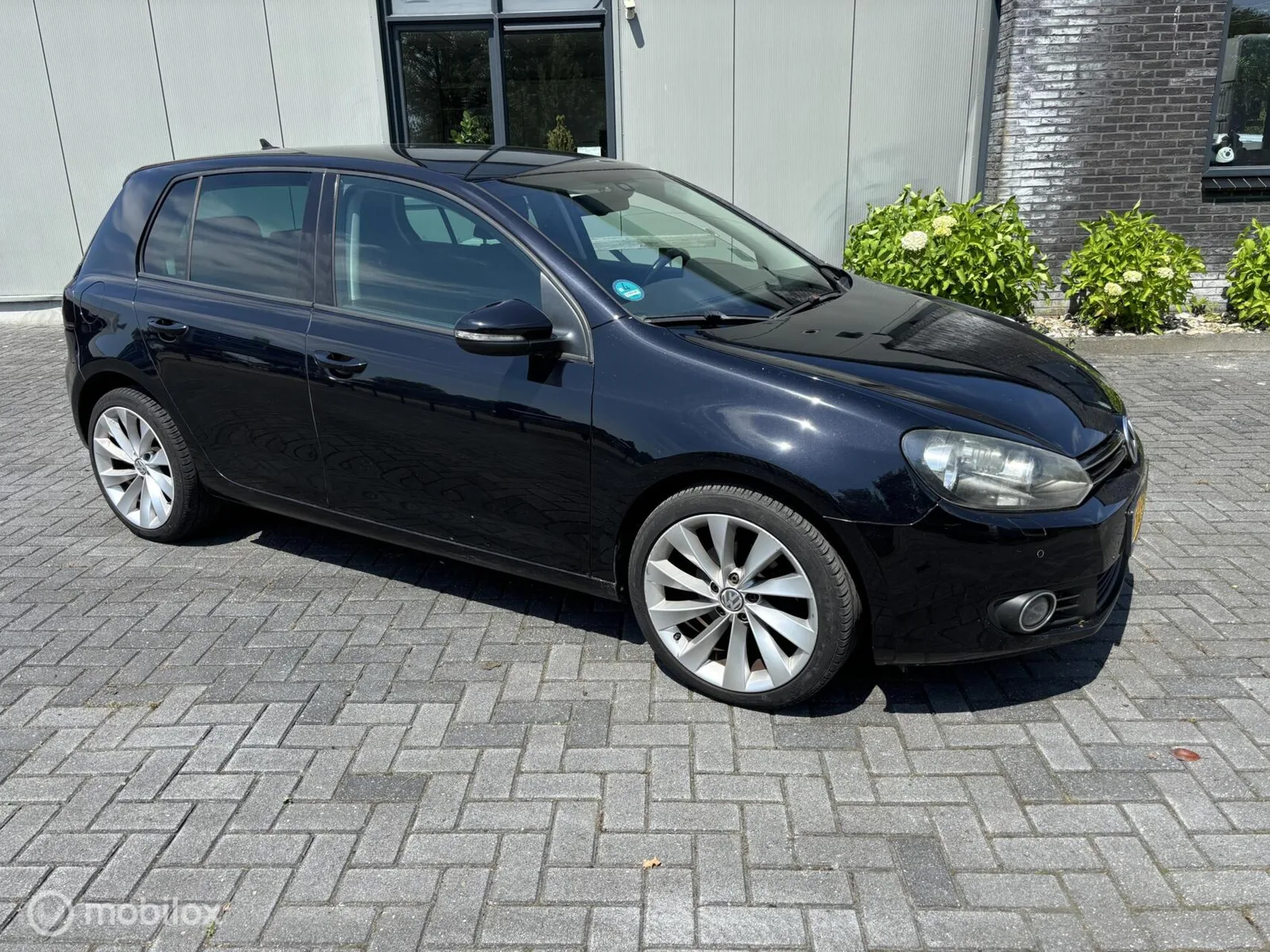 Volkswagen Golf (2009) — foto 1