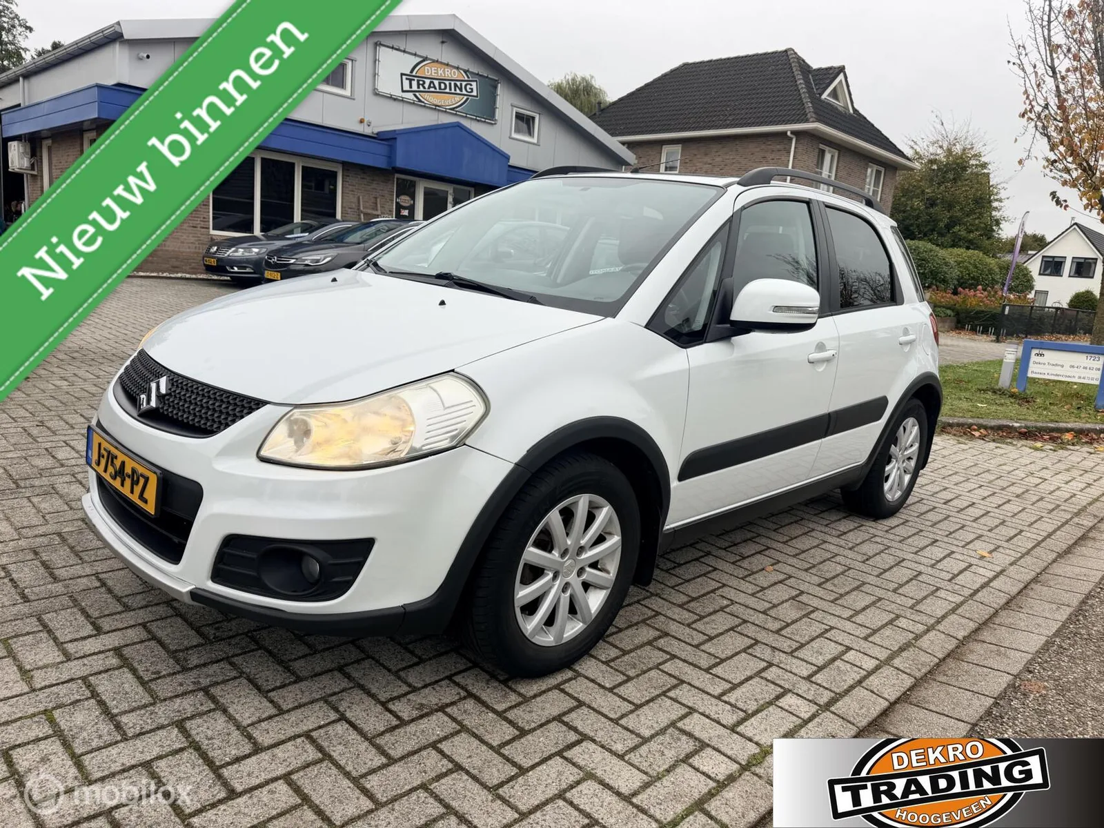 Suzuki SX4 (2011) — foto 1