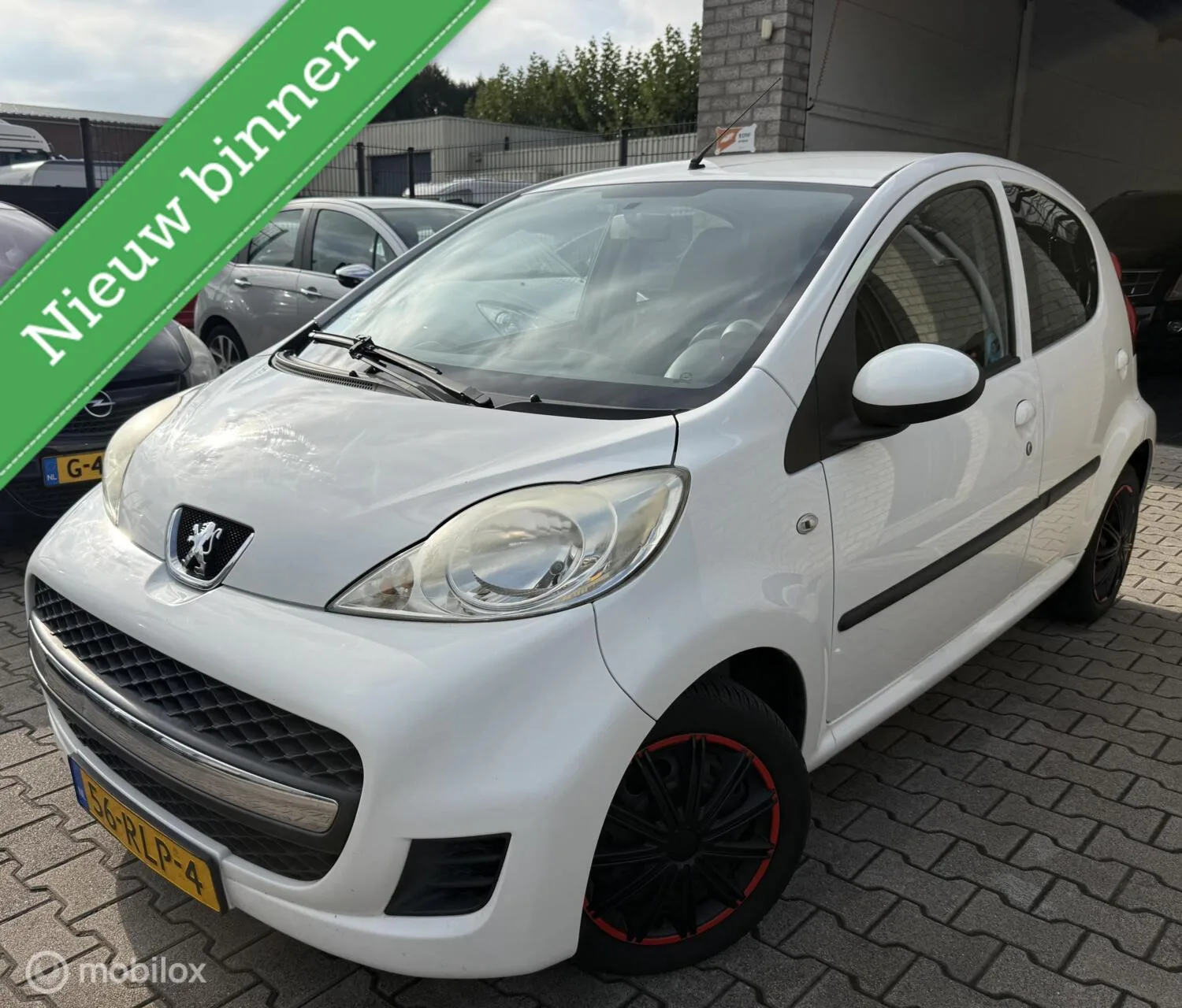 Peugeot 107 (2011) — foto 1
