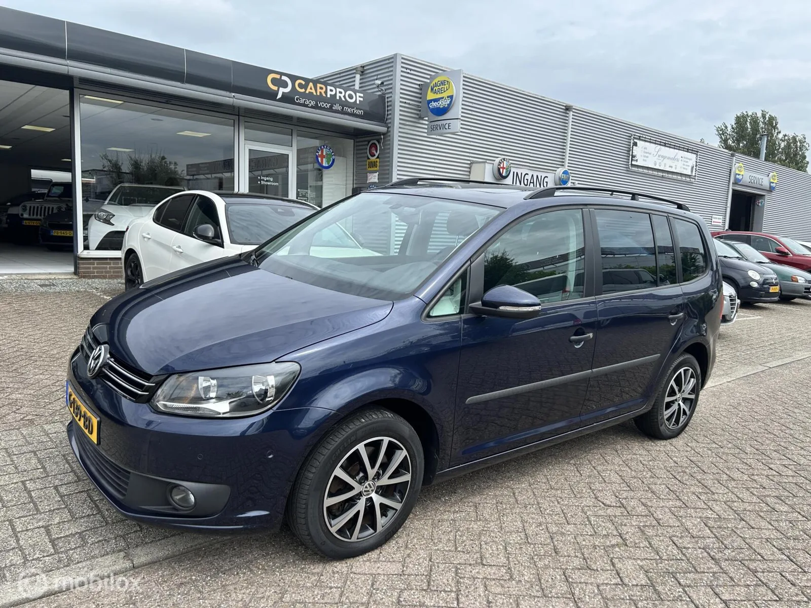 Volkswagen Touran (2014) — foto 1