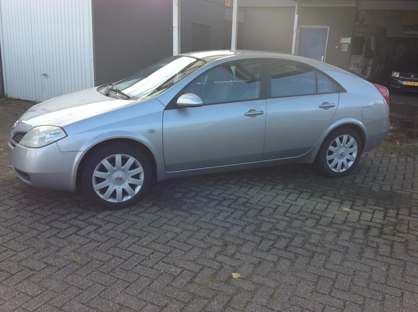Nissan Primera (2005) — foto 1