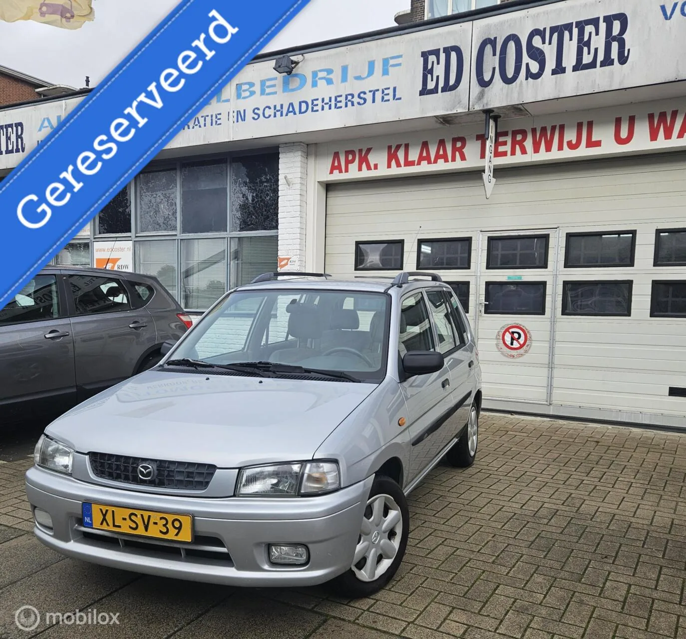 Mazda Demio (1999) — foto 1