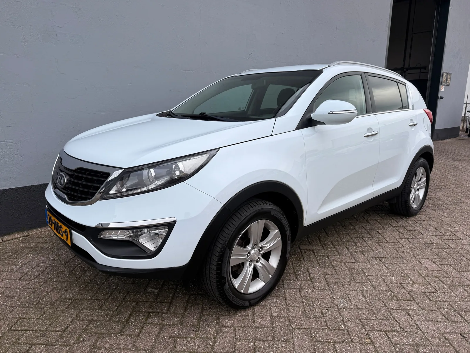Kia Sportage (2010) — foto 1