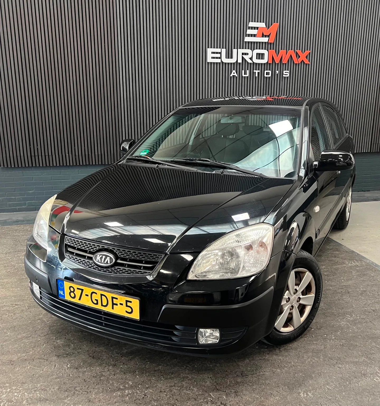 Kia Rio (2008) — foto 1