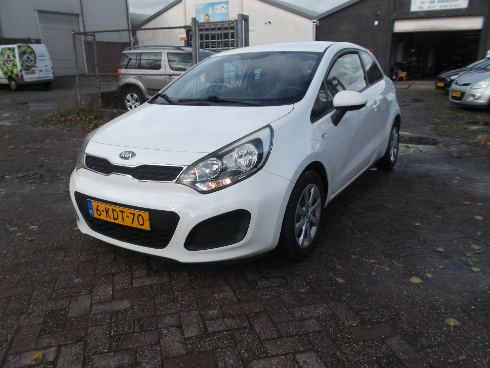 Kia Rio (2013) — foto 1