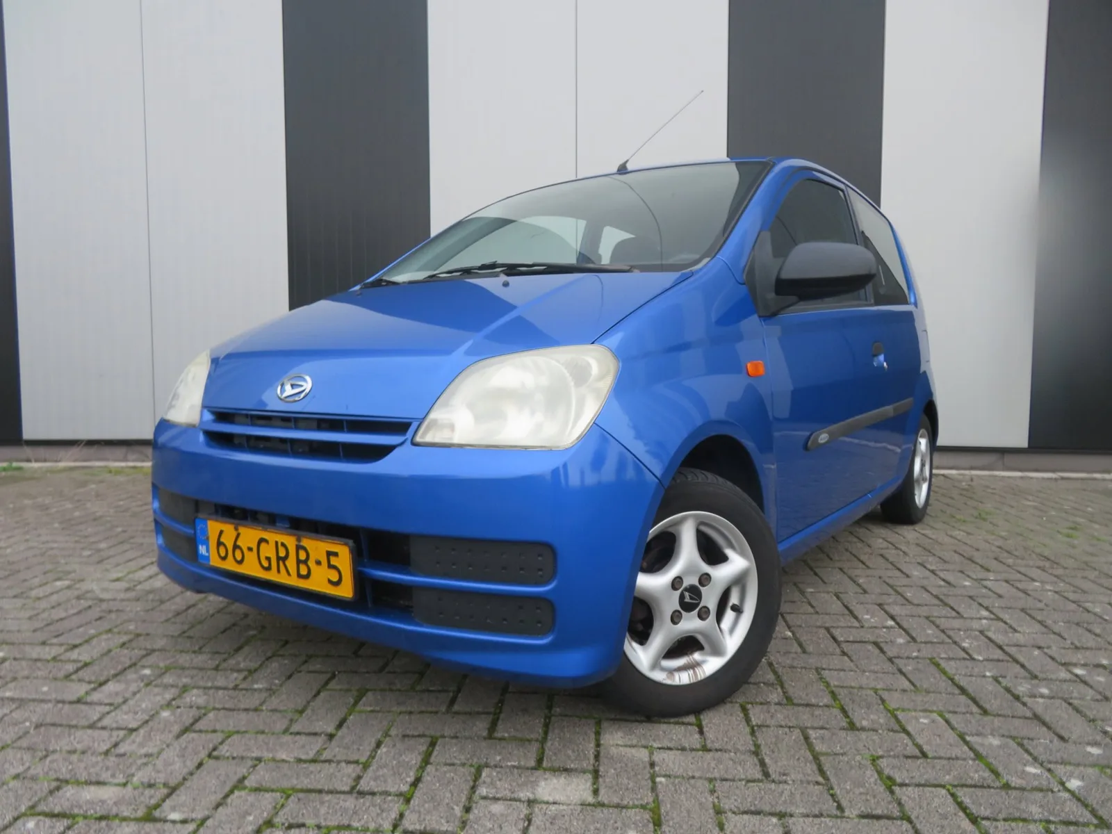 Daihatsu Cuore (2008) — foto 1