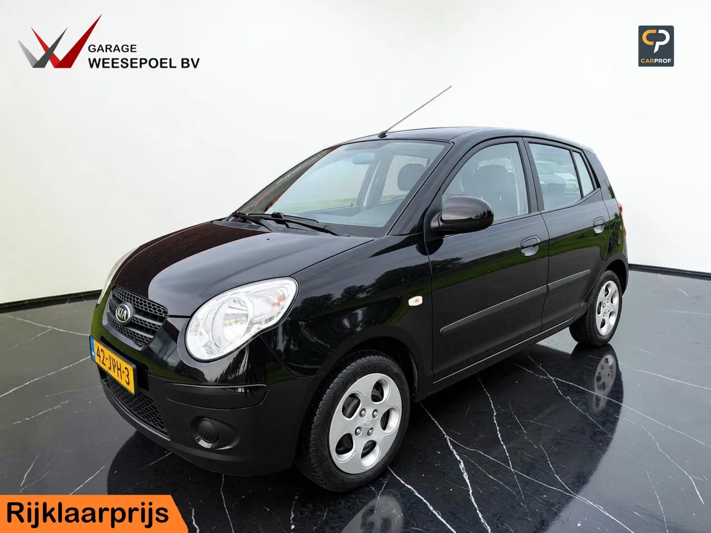 Kia Picanto (2009) — foto 1