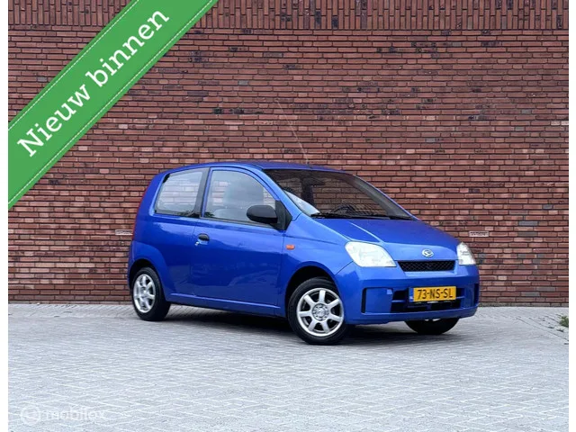 Daihatsu Cuore (2004) — foto 1