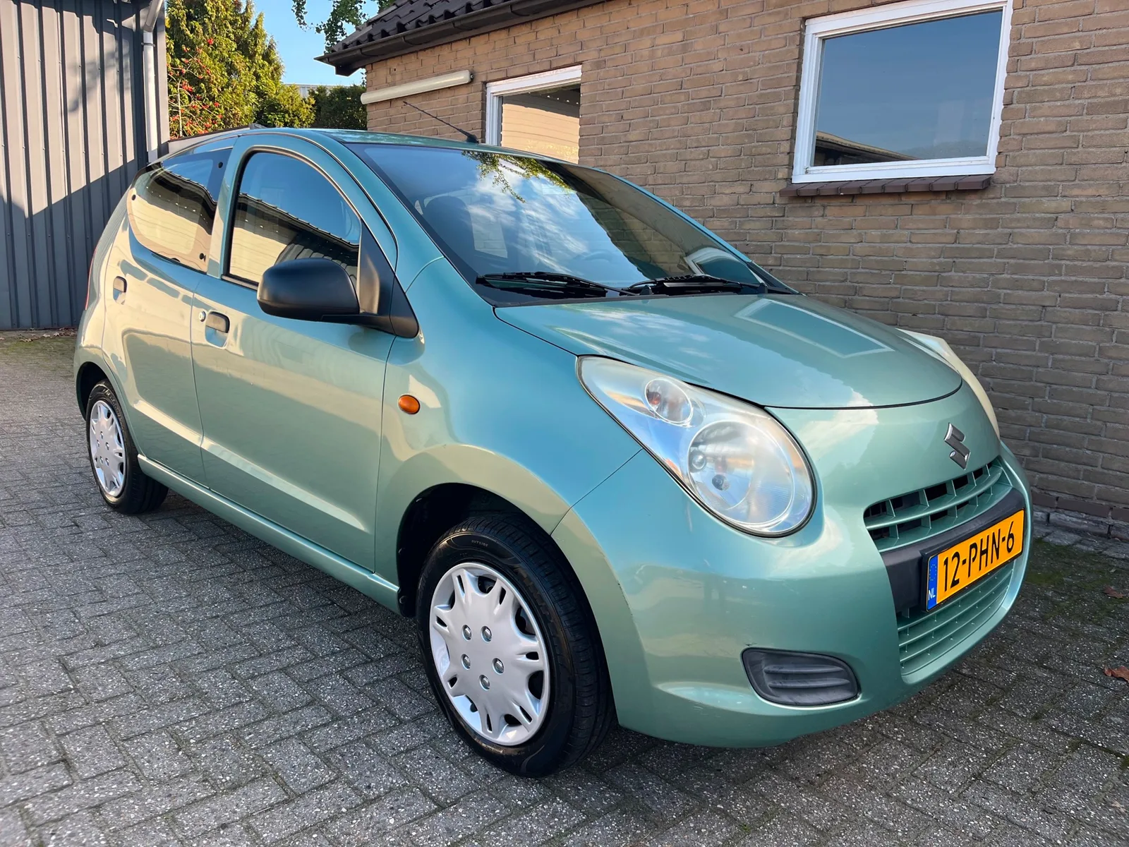 Suzuki Alto (2011) — foto 1