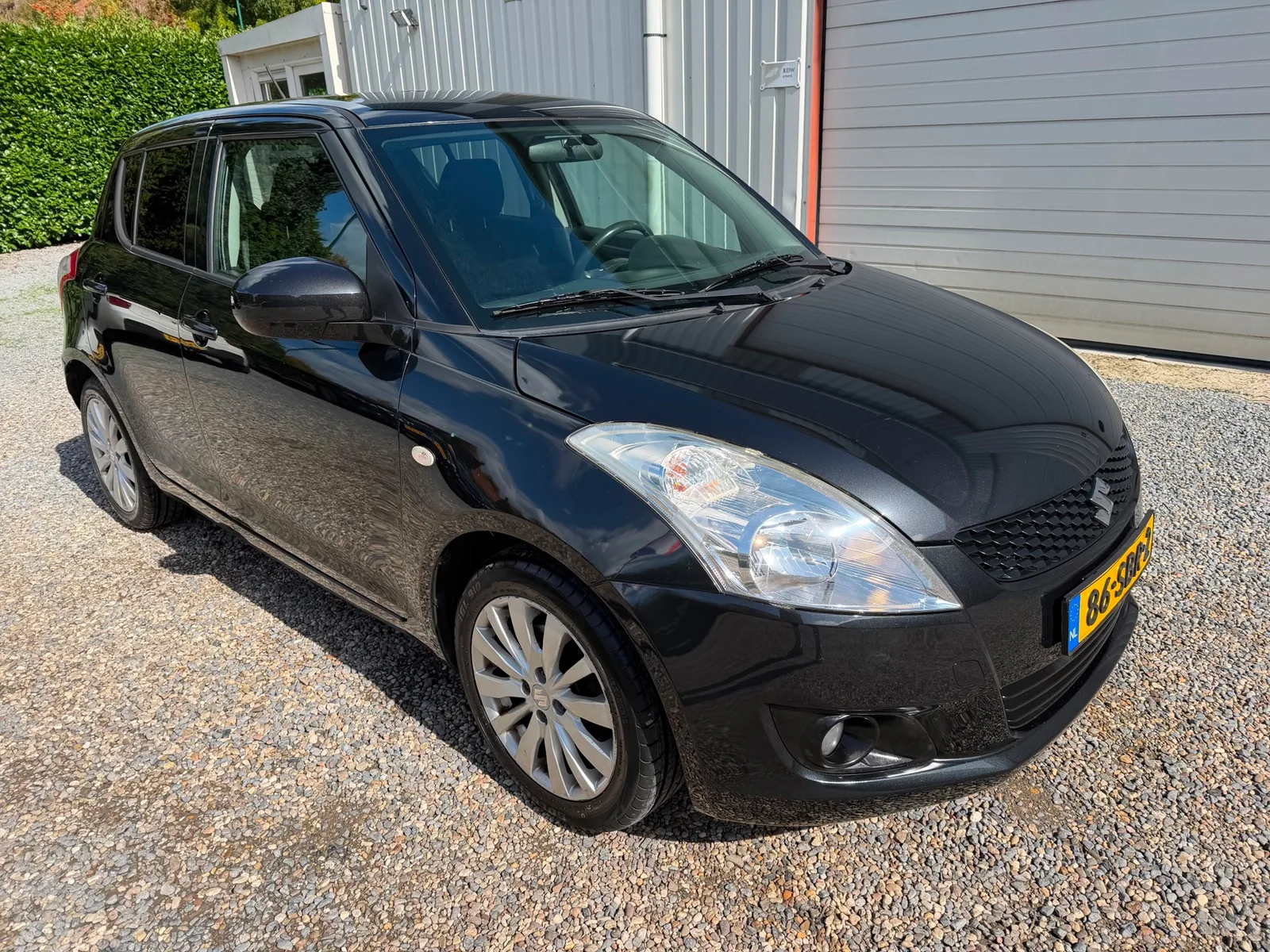 Suzuki Swift (2011) — foto 1