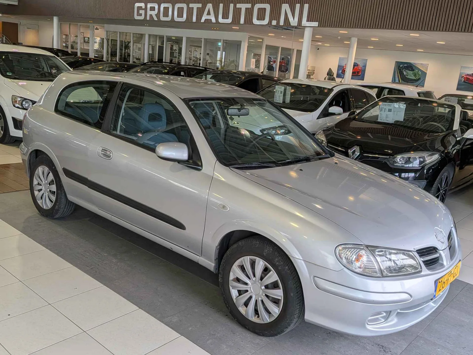 Nissan Almera (2000) — foto 1