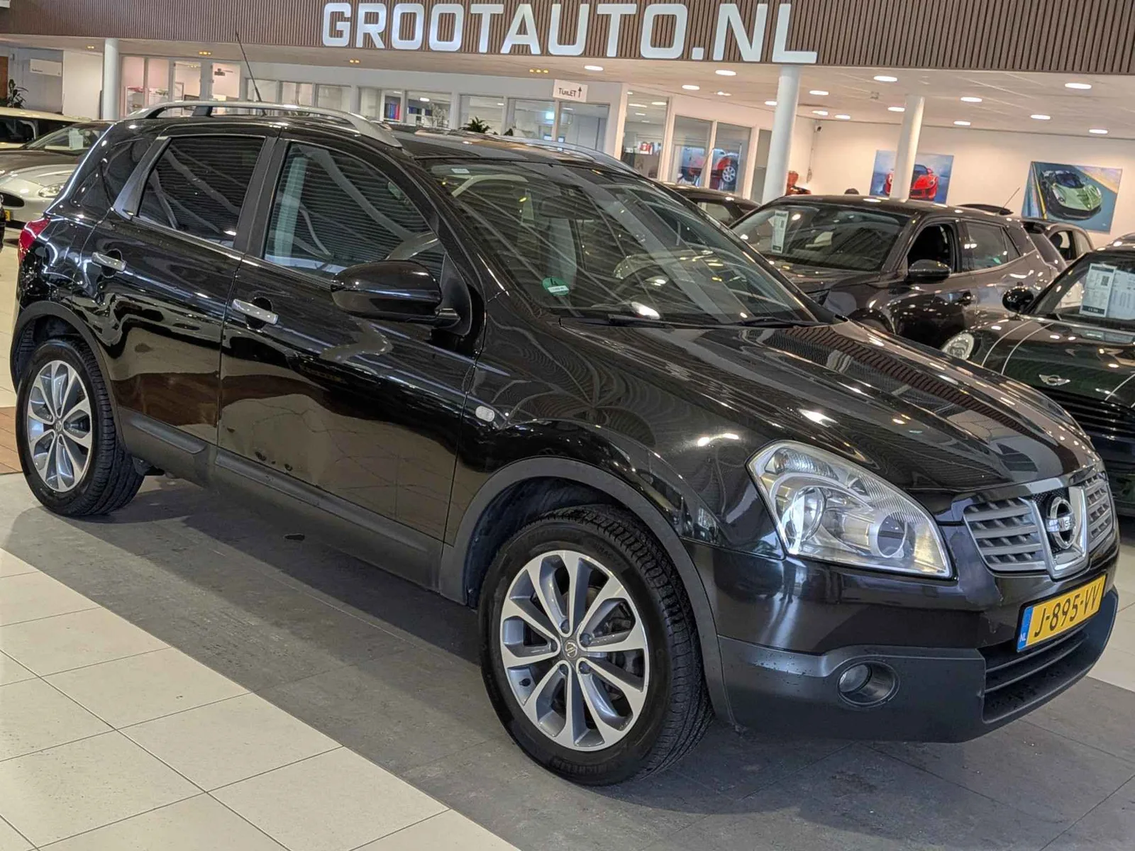 Nissan Qashqai (2009) — foto 1