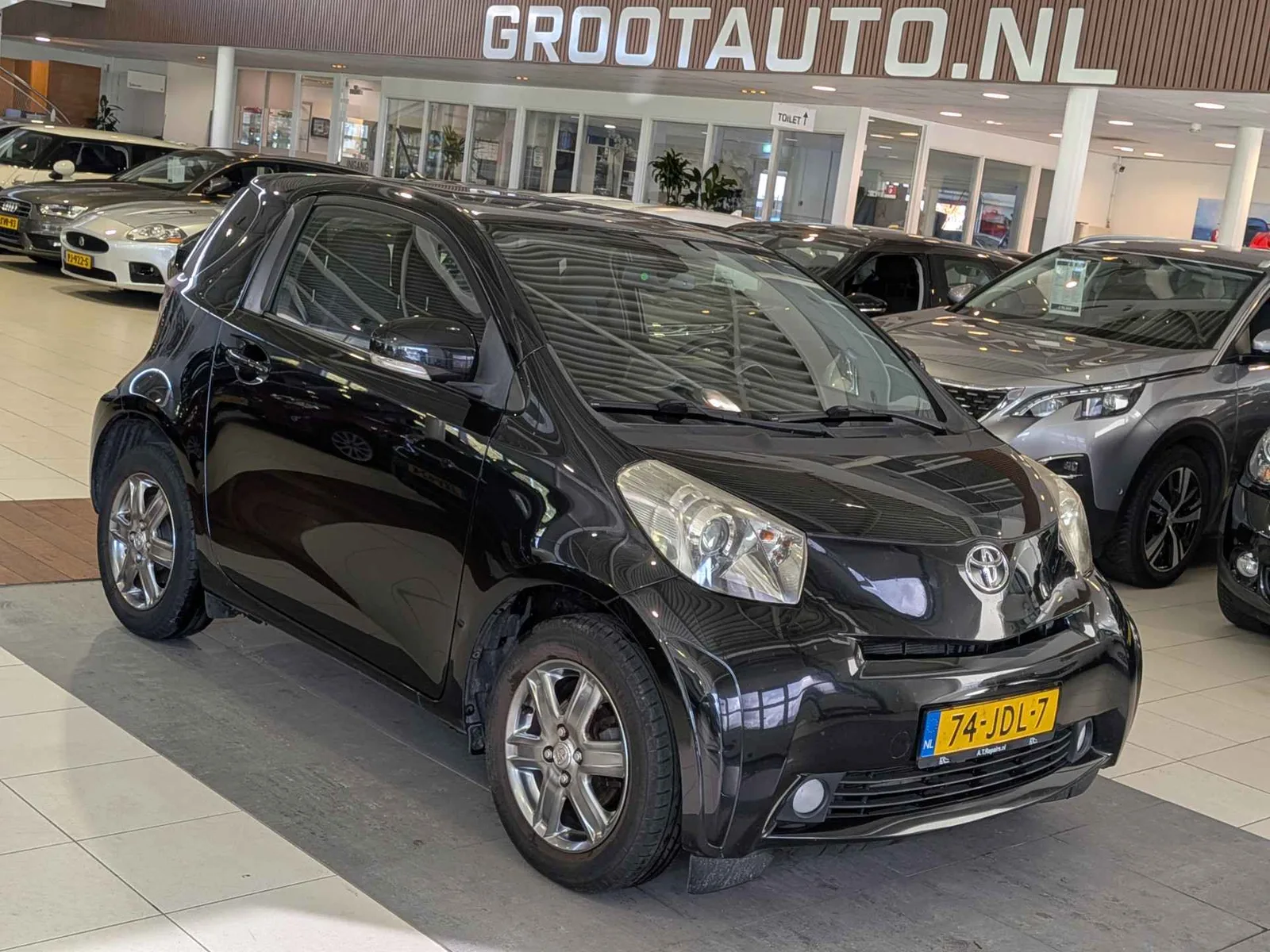Toyota iQ (2009) — foto 1