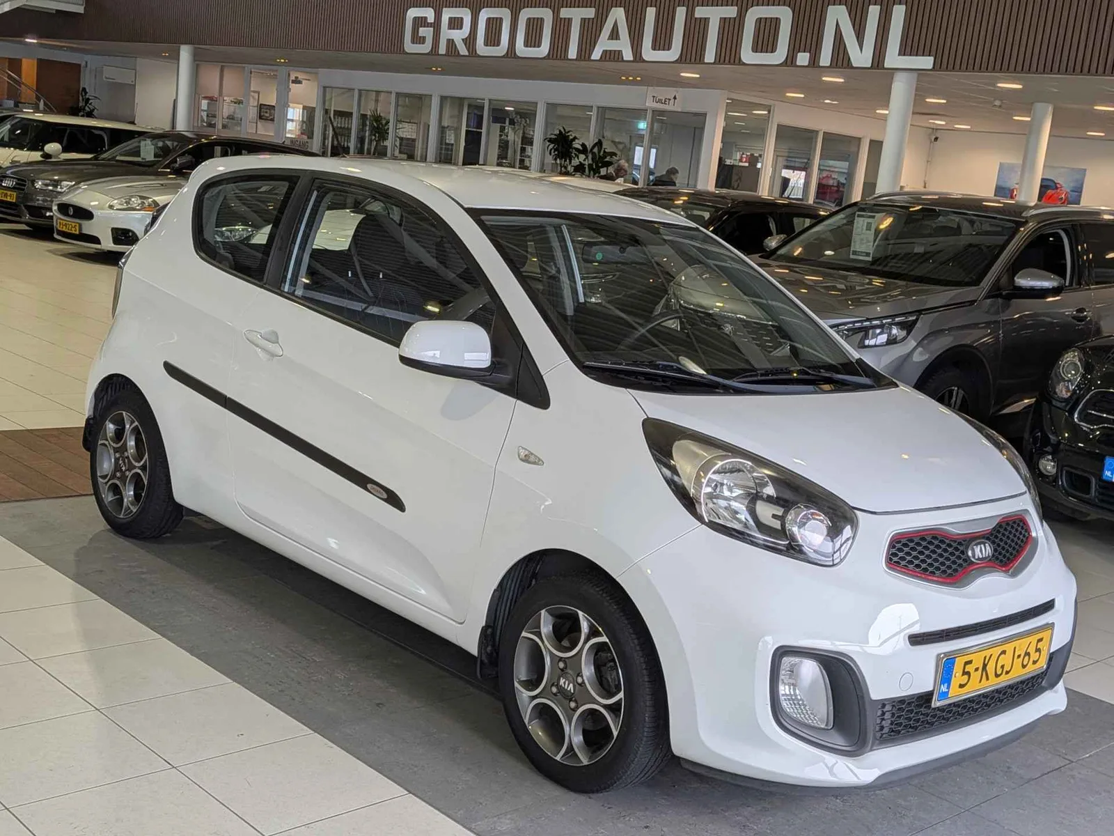 Kia Picanto (2013) — foto 1