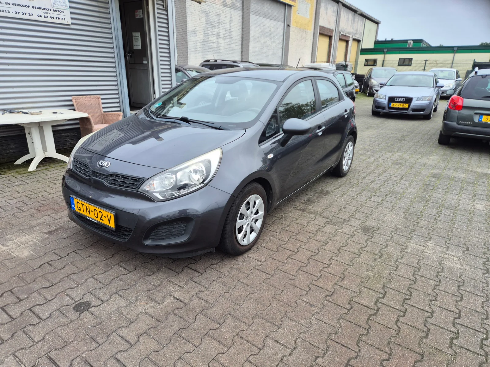 Kia Rio (2014) — foto 1
