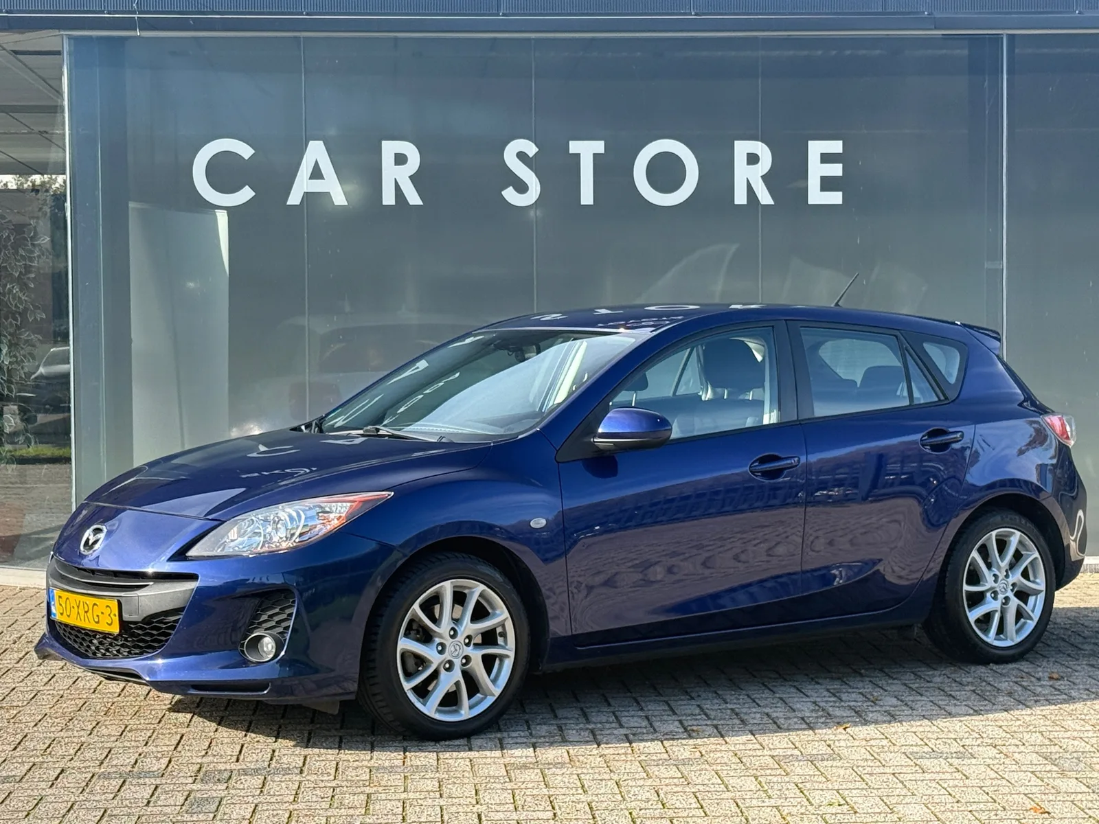 Mazda 3 (2012) — foto 1