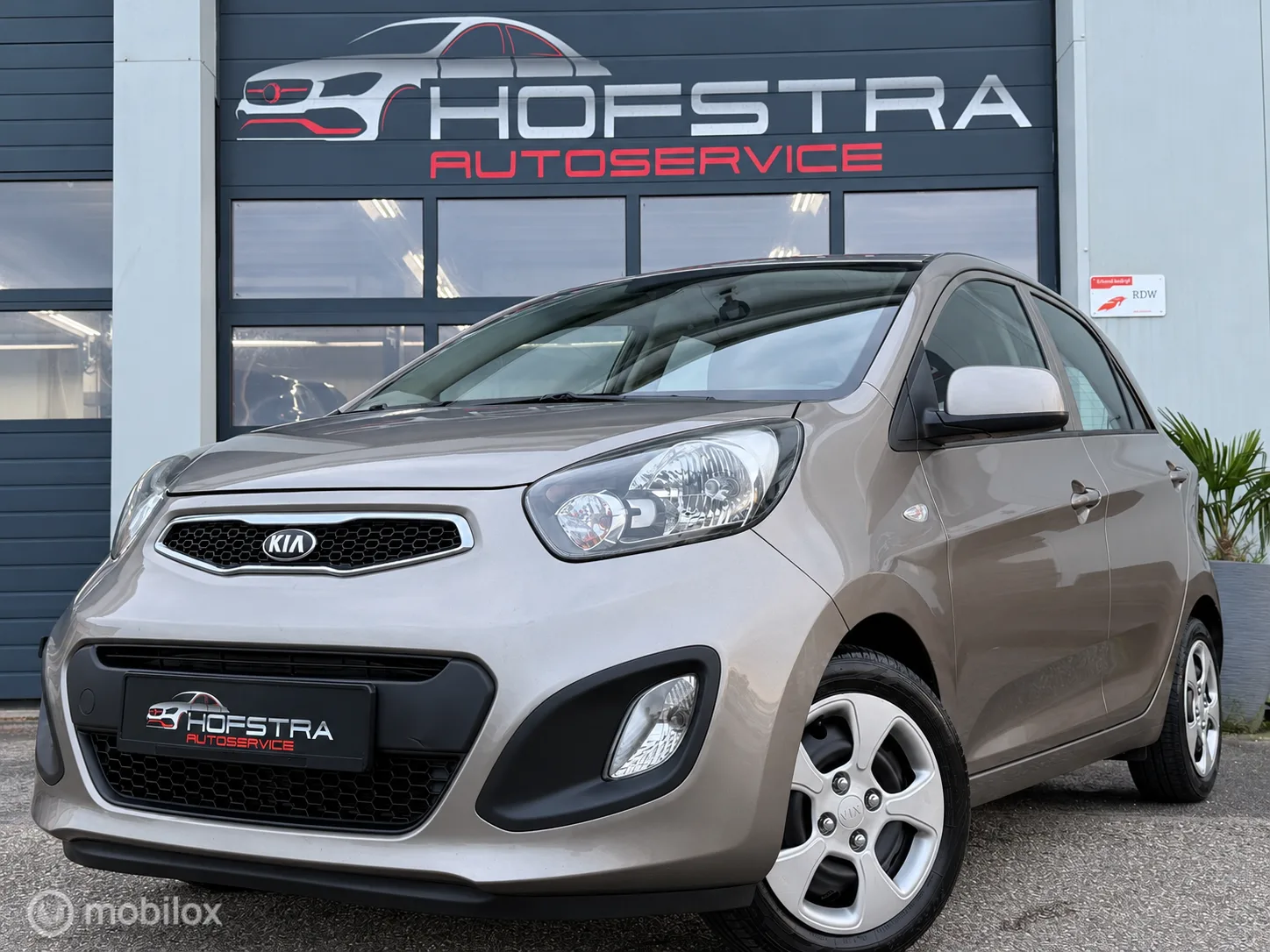 Kia Picanto (2013) — foto 1