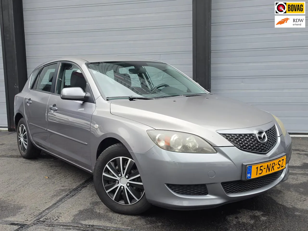 Mazda 3 (2004) — foto 1