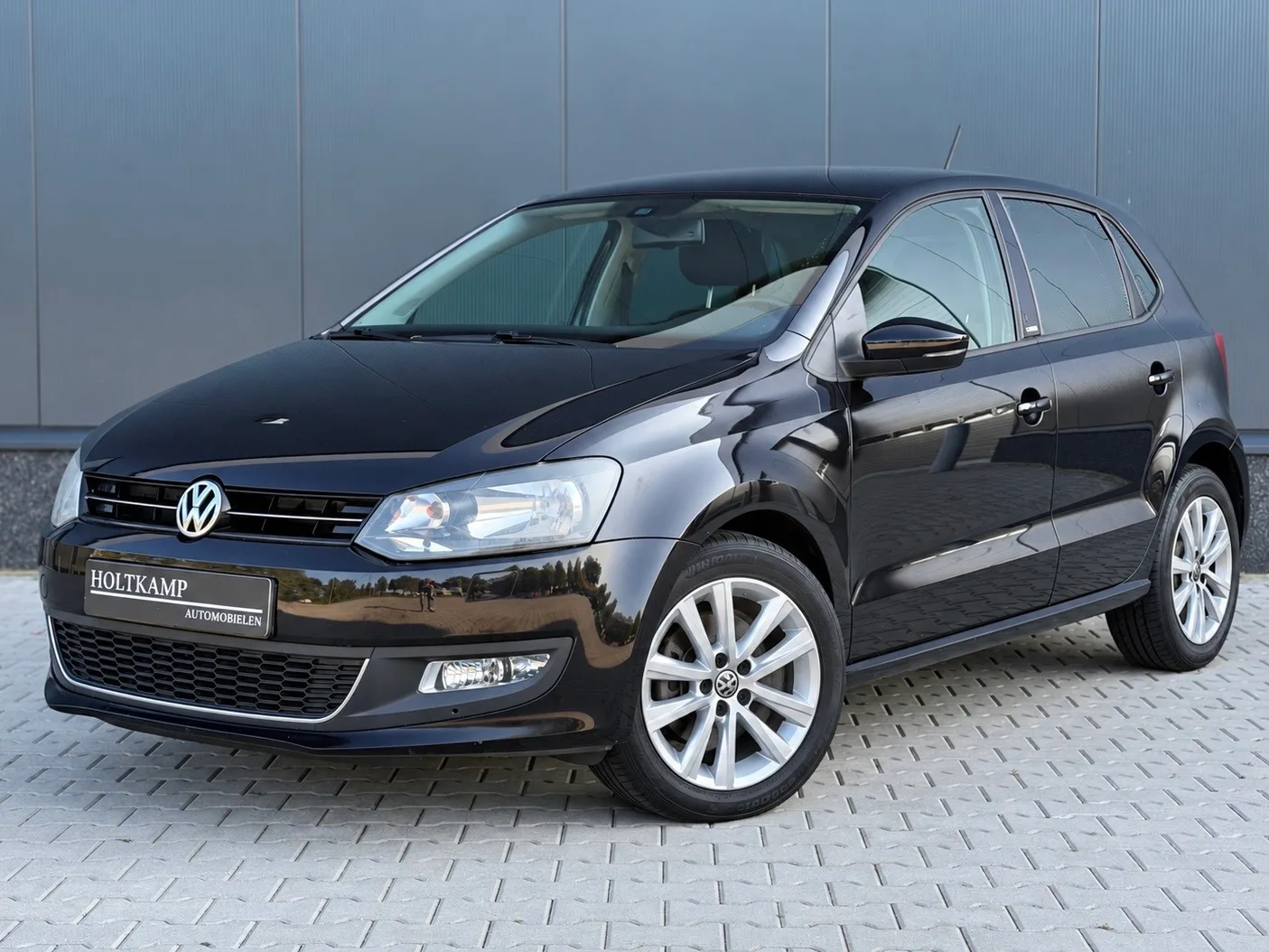 Volkswagen Polo (2011) — foto 1