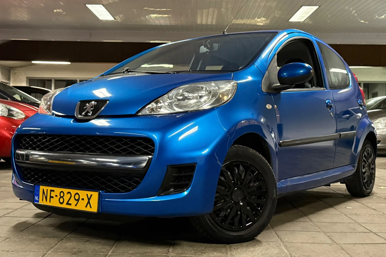 Peugeot 107 (2011) — foto 1