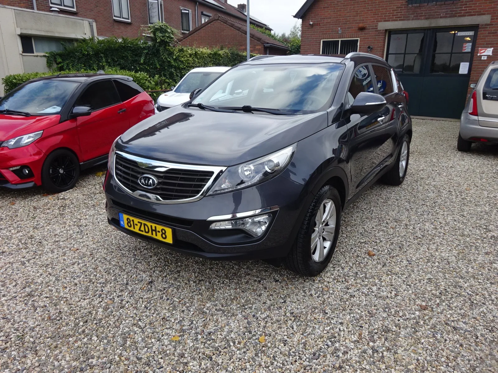 Kia Sportage (2012) — foto 1