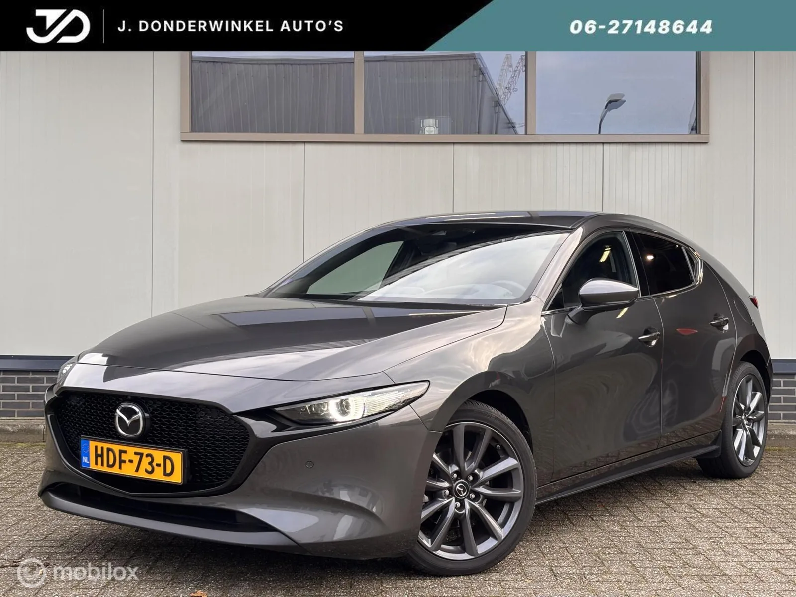 Mazda 3 (2023) — foto 1
