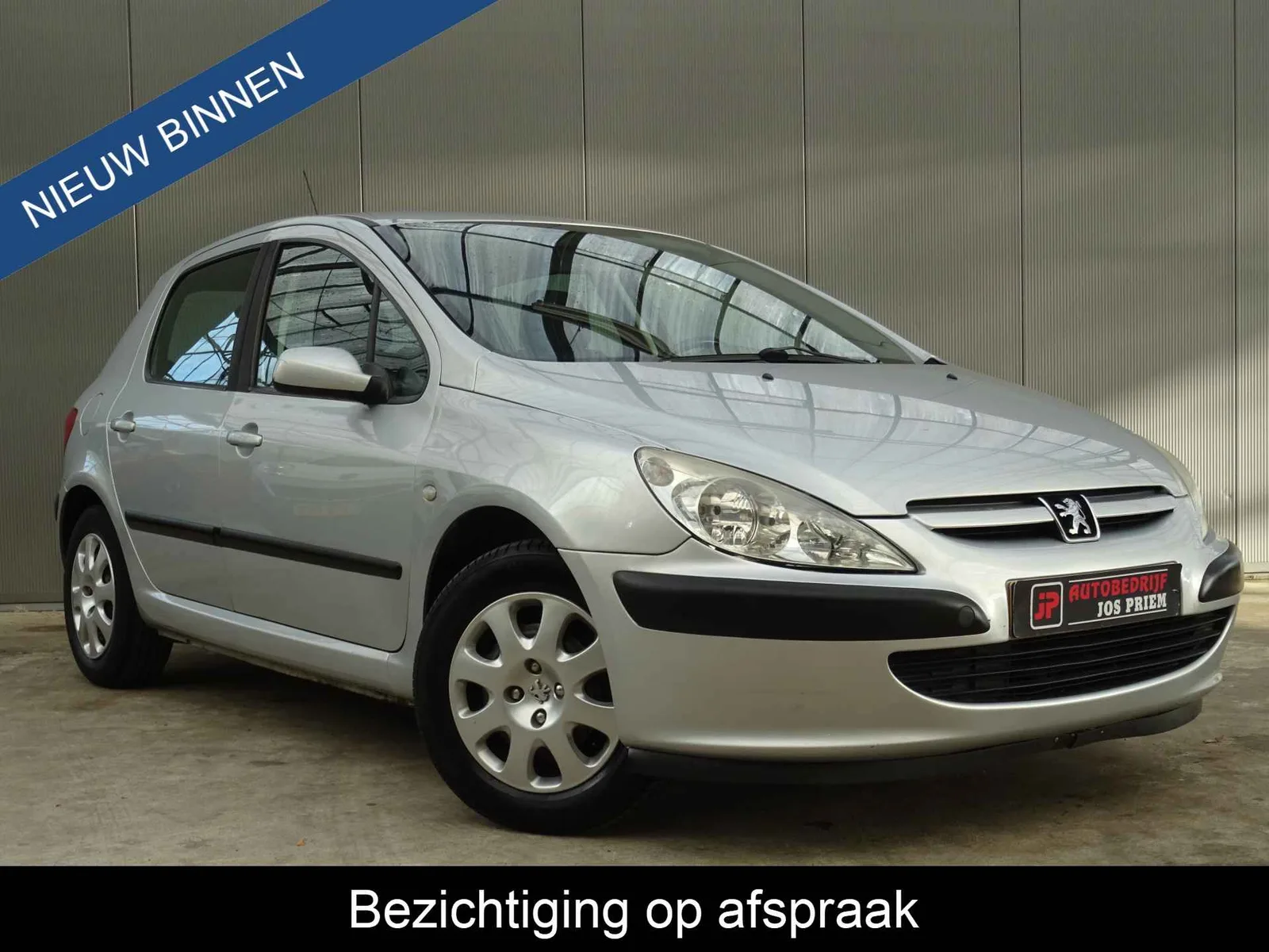 Peugeot 307 (2004) — foto 1