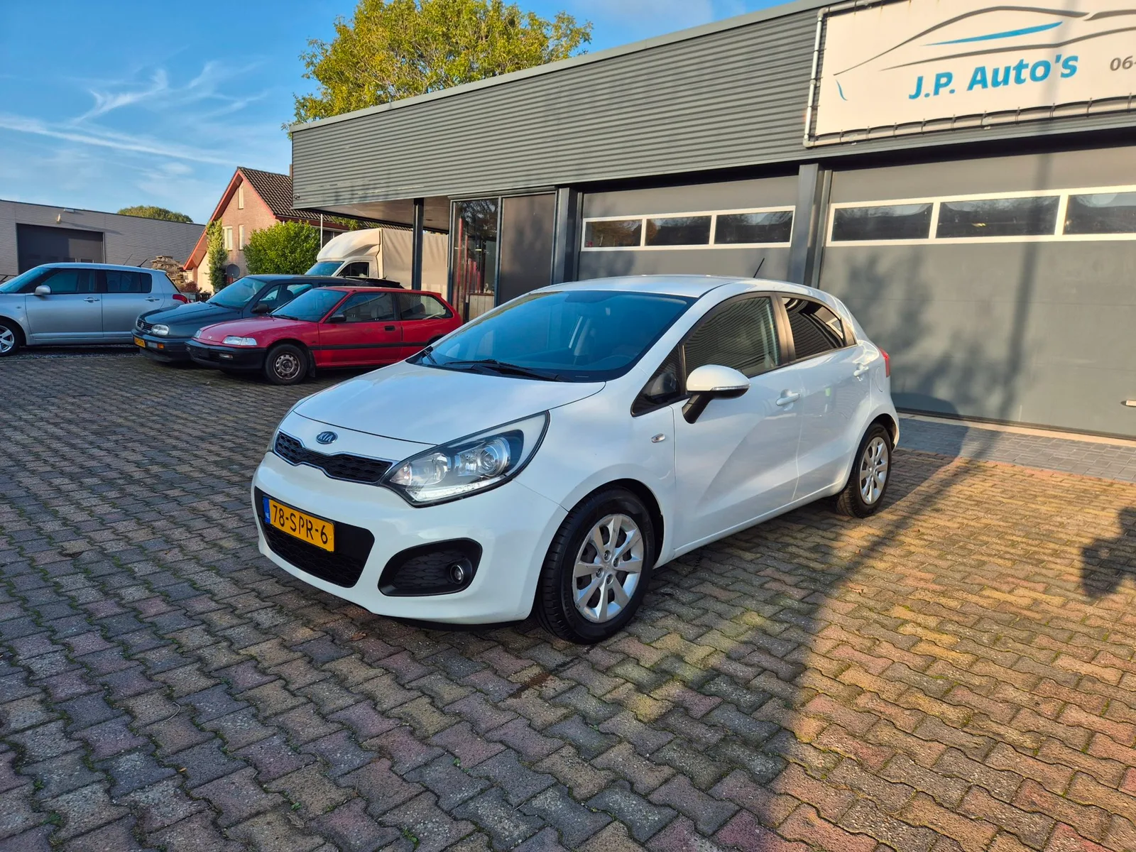 Kia Rio (2011) — foto 1