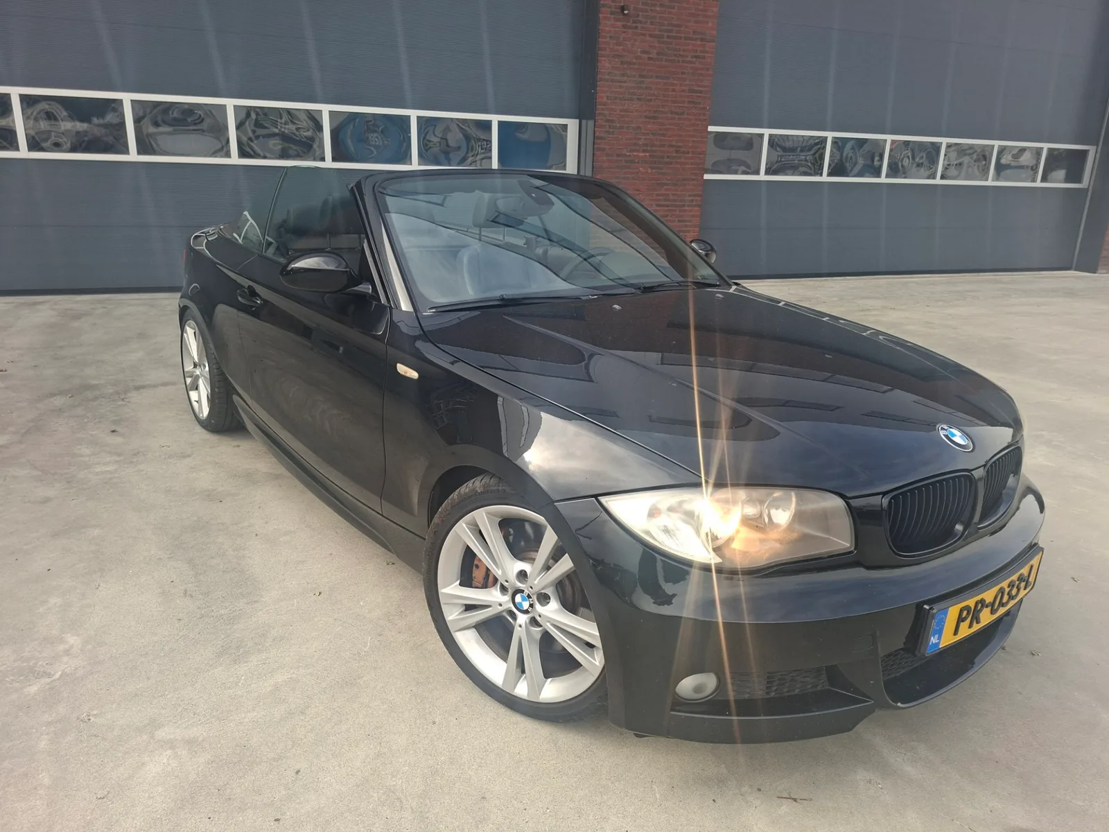 BMW 1-Serie (2009) — foto 1