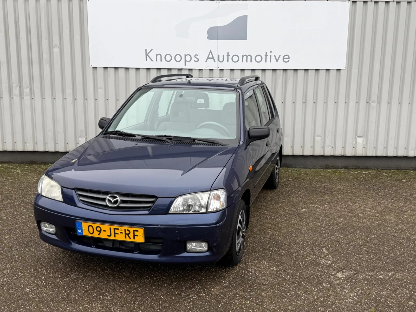 Mazda Demio (2002) — foto 1