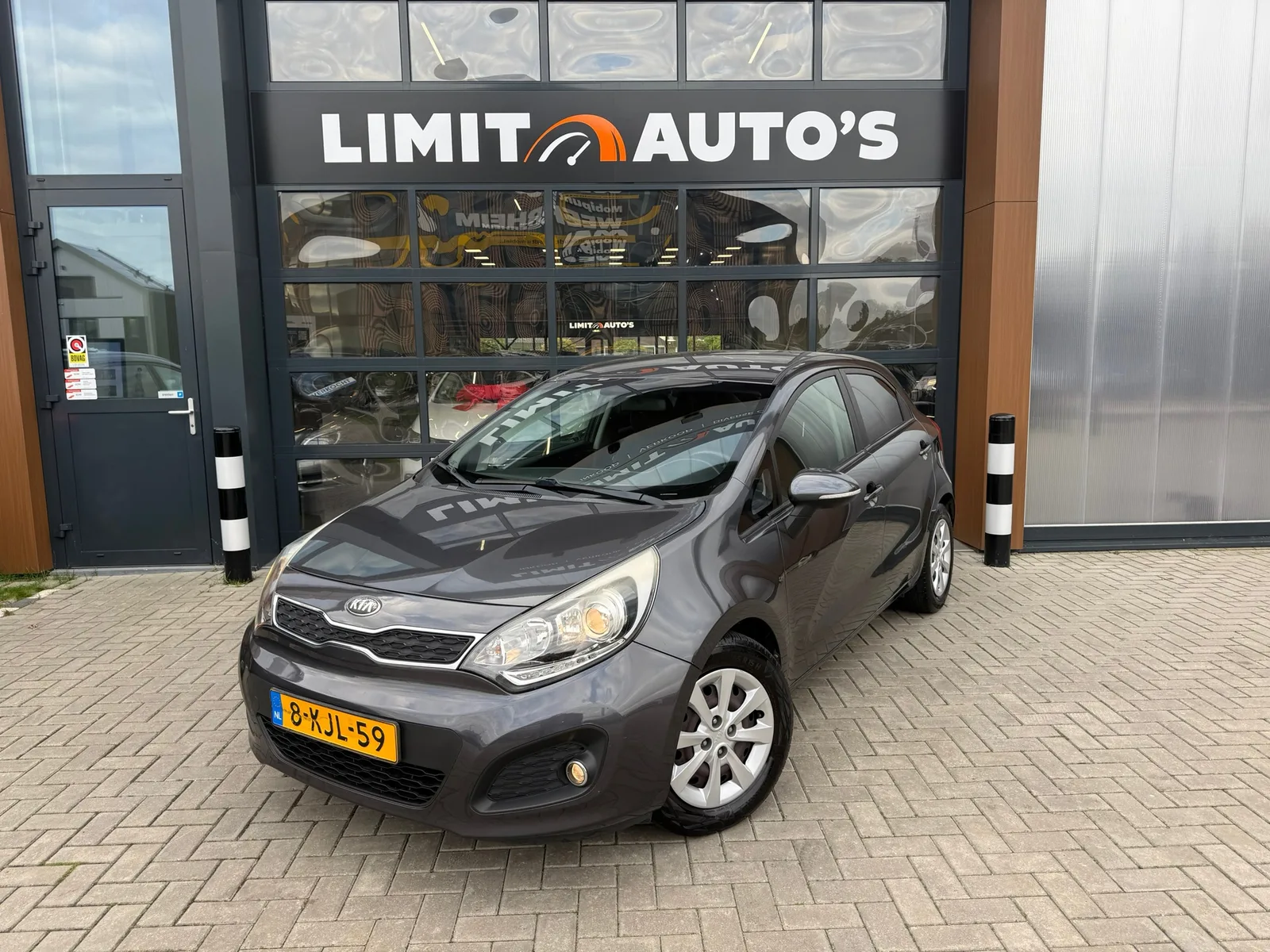 Kia Rio (2013) — foto 1