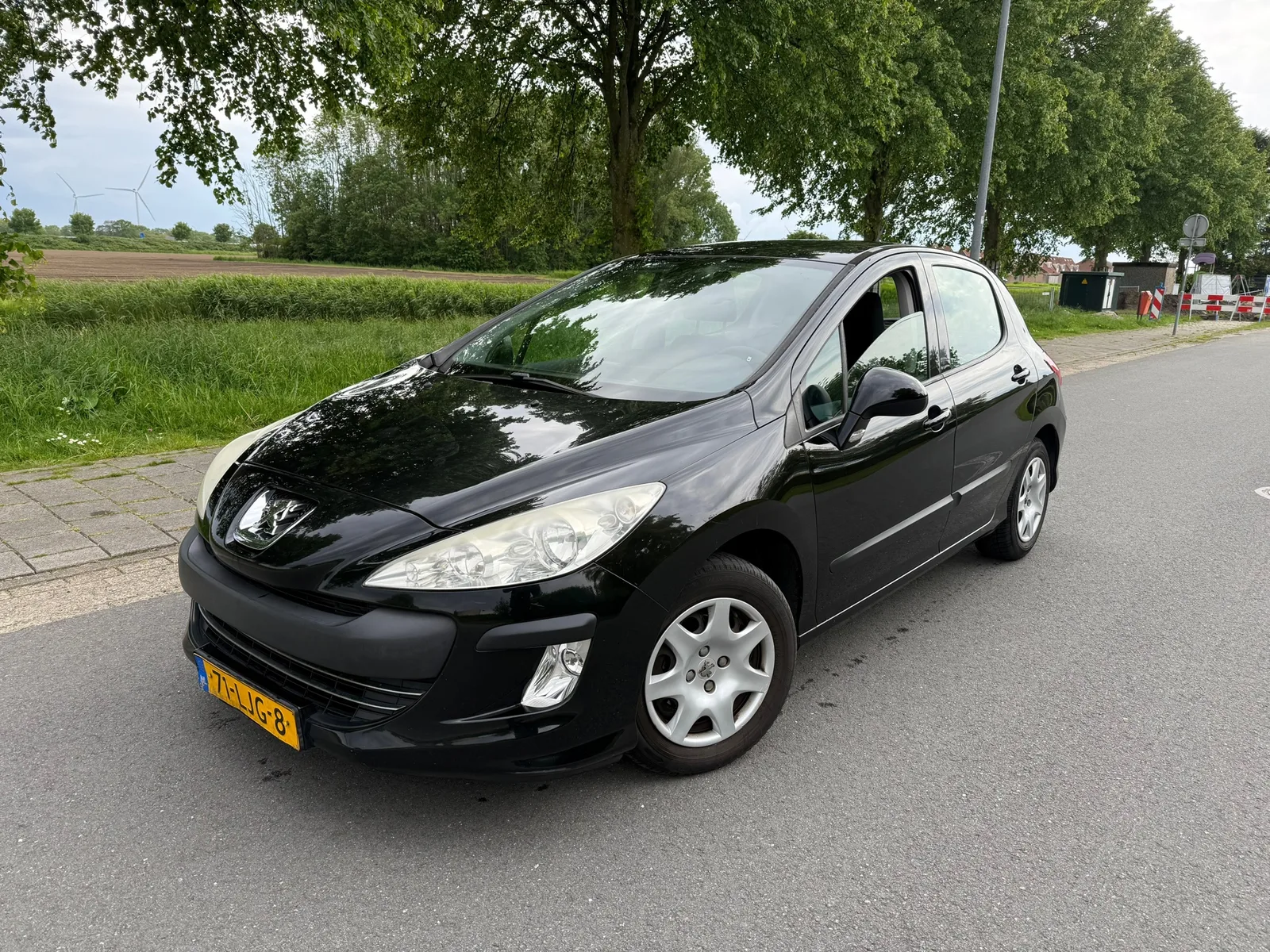 Peugeot 308 (2010) — foto 1