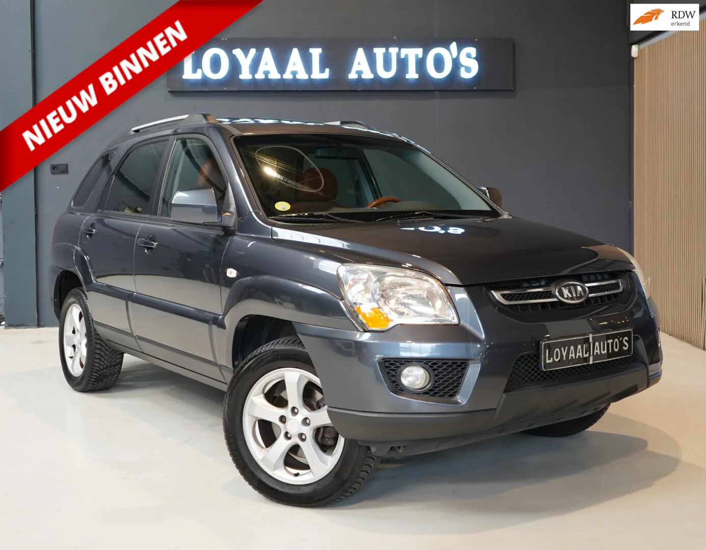 Kia Sportage (2009) — foto 1