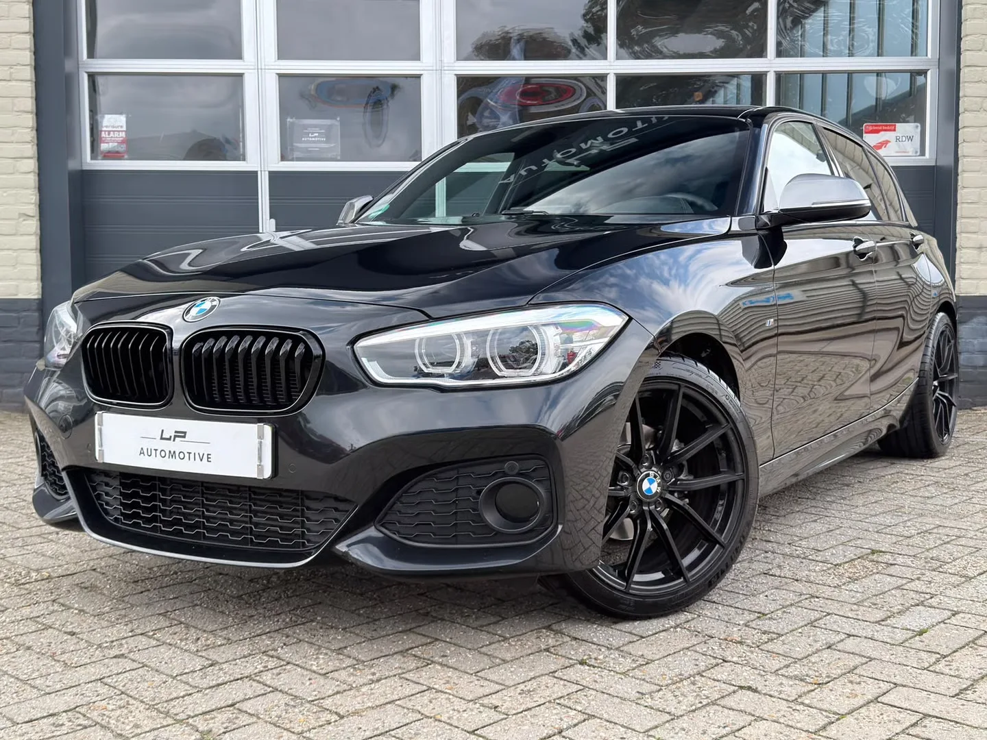 BMW 1-Serie (2018) — foto 1