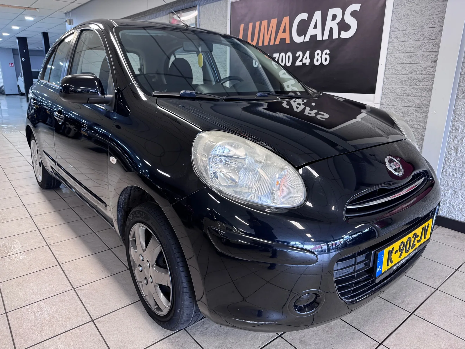 Nissan Micra (2011) — foto 1