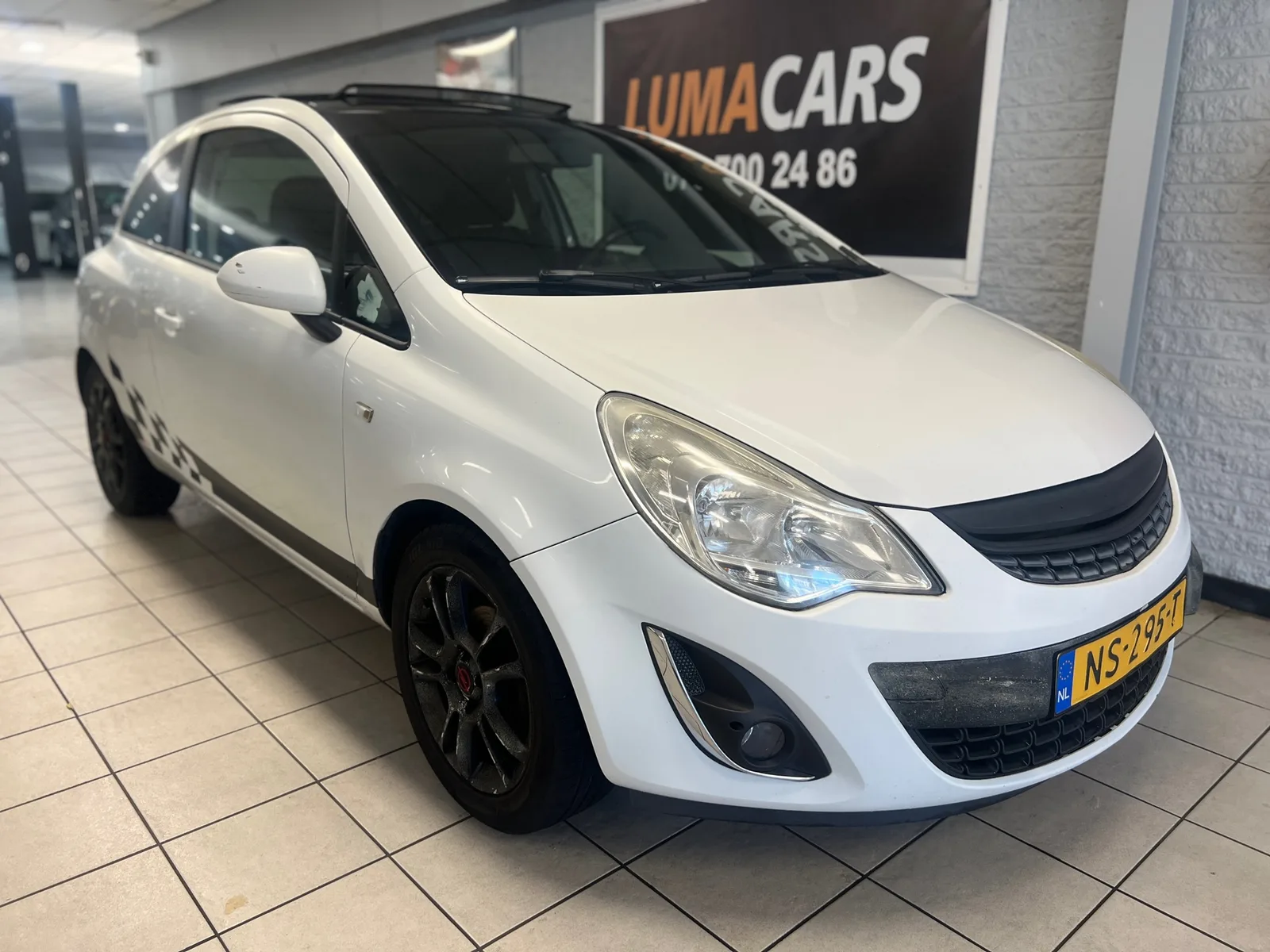 Opel Corsa (2011) — foto 1