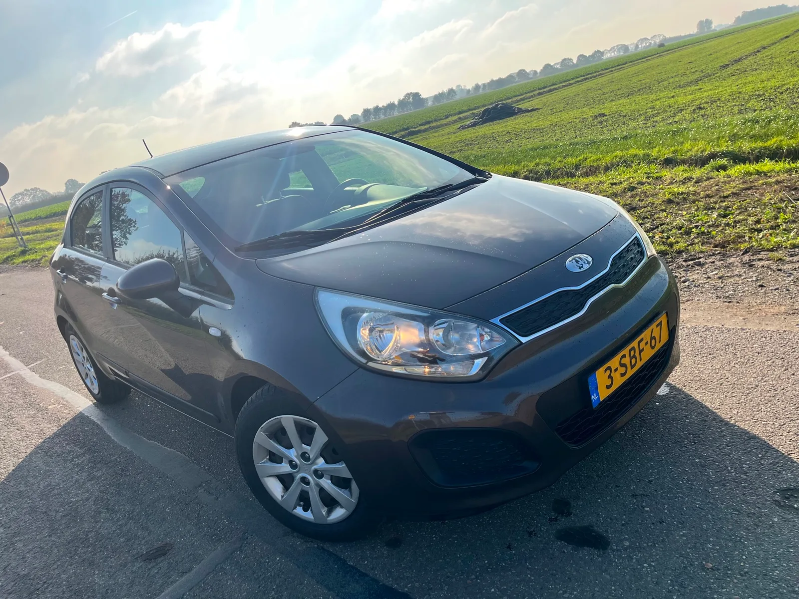 Kia Rio (2013) — foto 1
