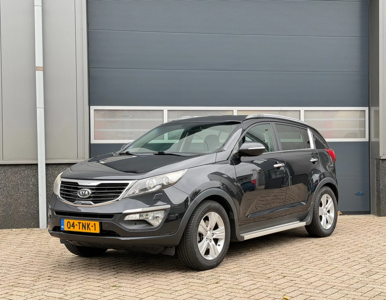 Kia Sportage (2012) — foto 1